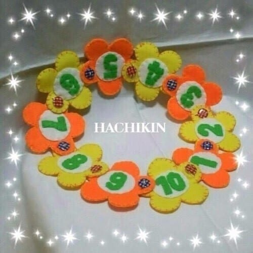 知育おもちゃ作ります 黄色とオレンジのポカポカ色の花のボタンつなぎです イメージ1